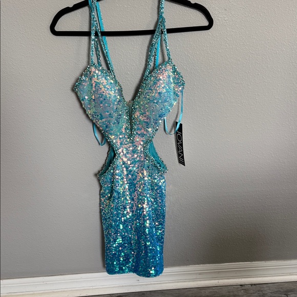 Jovani Dresses & Skirts - Jovani Iridescent Turquoise Sequin Cutout Dress BNWT